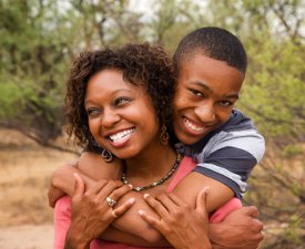 Recovery Coaching Packages | Happy African American Family: Mother and Son